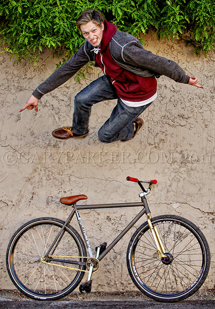 Forest runs across the wall for his official fixed gear portrait...  (NOT Photoshop) 