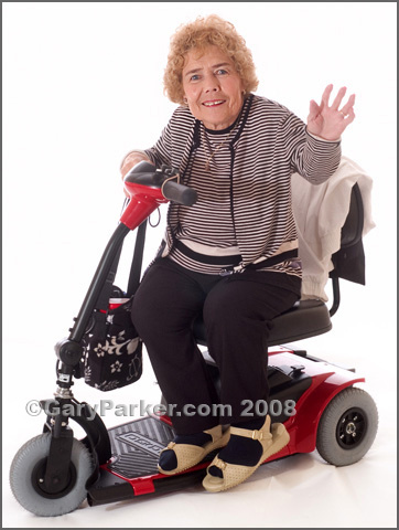 Betty Binkley, Diastrophic Dysplasia.  Many Little People use scooters to get around more quickly.