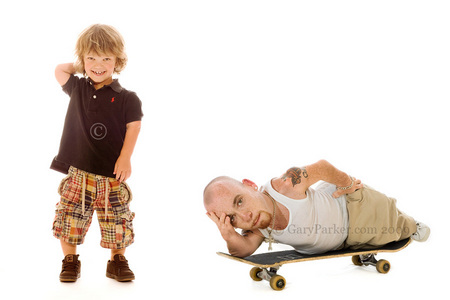 Lewie Pierson, right, born with Diastrophic Dwarfism, fits neatly on a skatebaord.  The young boy at left (ID to come) has Achondroplasia.  90% of all Little People have Achondroplasia.