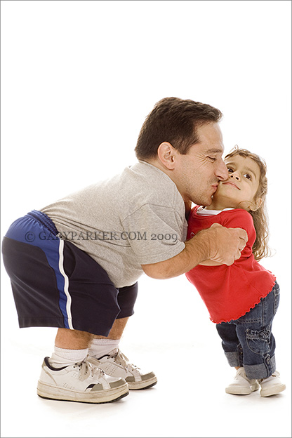 Mark Trombino with daughter Priya, both of whom have dwarfism type SEDc.  Mark is 39"; Priya, 5, is 26".