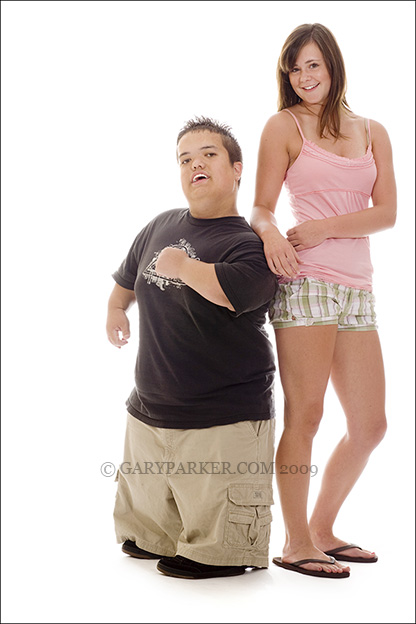 Casey Prengel, left, born with achondroplasia, with friend Brittany Betts