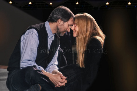 Steve Jobs with wife Laurene, the day the original multi-colored iMac was released on 8.15.98.  After Steve's worldwide satellite feed at a large venue near Apple, Laurene approached for this intimate moment. The iMac changed Apple's fortunes and became the world's best selling computer.