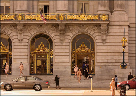 One day we were in San Francisco at City Hall.  We looked up and there were naked people who quickly put their long coats back on and disappeared...  We have no idea what this was about...