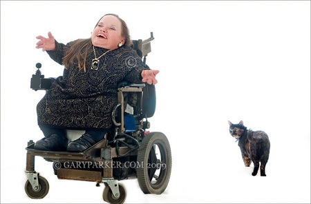 Gracie Oliver, Parastramatic Dwarfism, one of LPA's most delightful personalities, with her traveling kitty Jasmina.  Gracie typifies the happy, optimistic, inspiring spirit of many Little People.