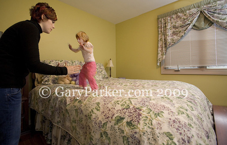 Kenadie (age 4) and Mom jump on bed